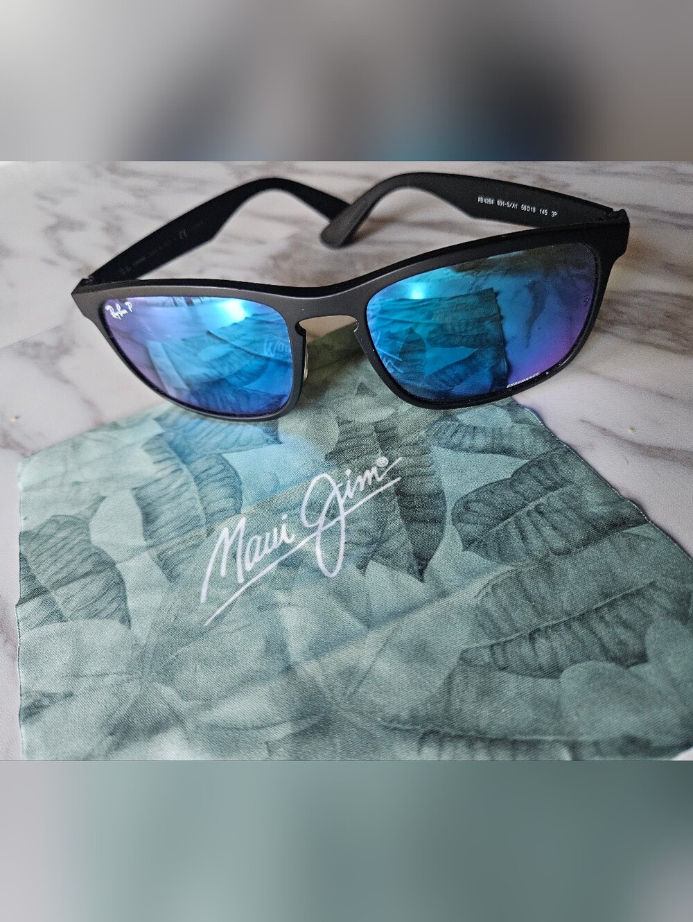 Maui Jim Men’s Black Frame Sunglasses with Blue Mirror Lenses